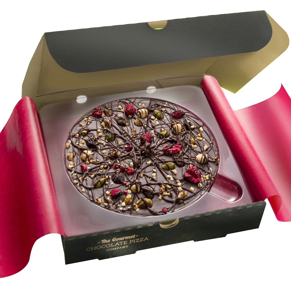 Vegan-friendly Decadent Dark Chocolate Pizza decorated with fruit and nuts